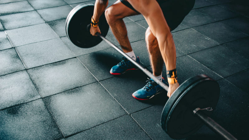 CrossFit class in progress with barbells